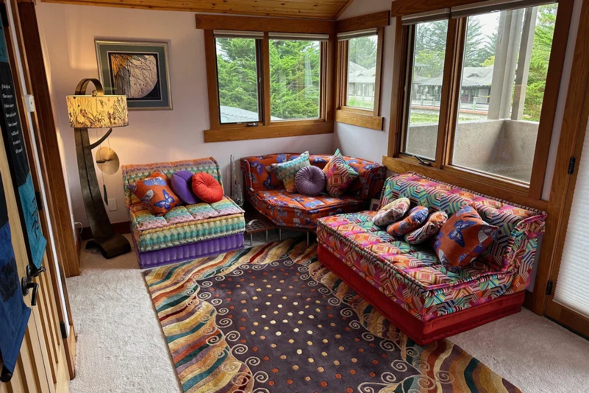 Custom L-shaped Mah Jong sofa with a hexagon corner in violet and orange prints
