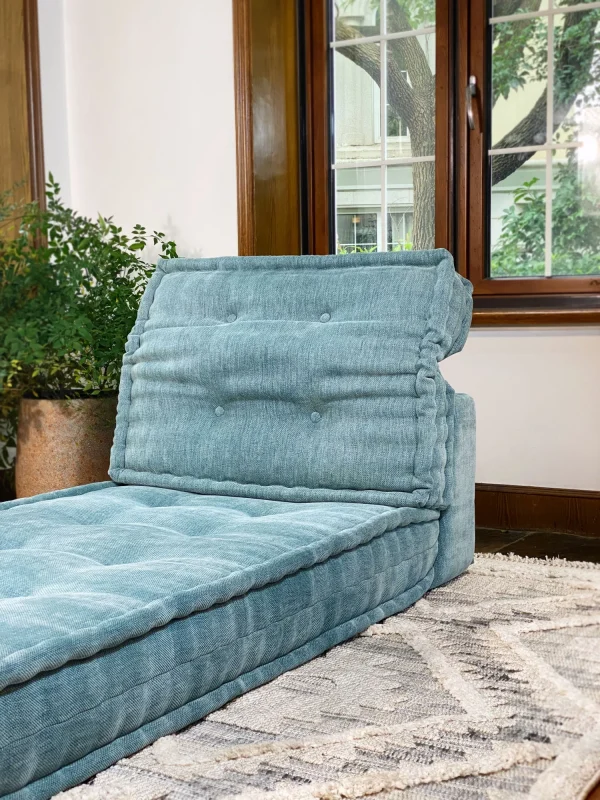 Adjustable backrest of the French Mah Jong Daybed Sofa, shown in a relaxed, reclined position.