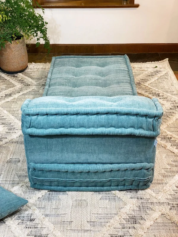 Overhead view of a French Mah Jong Daybed Sofa in teal, showing its thick padding and textured upholstery.