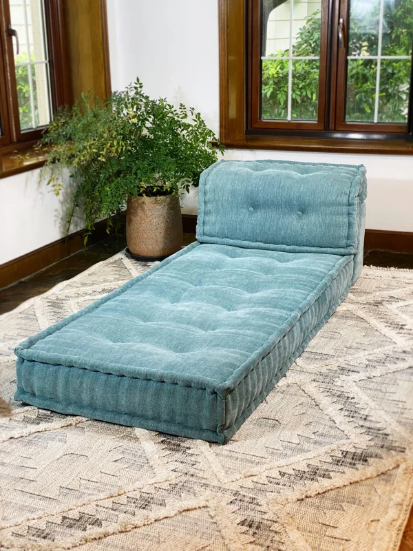 Close-up of a French Mah Jong Daybed Sofa’s tufted detailing and premium teal upholstery.