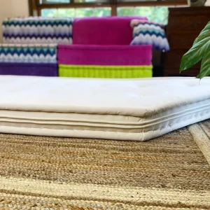 White cushion pad on a French daybed Mah Jong sofa with colorful modular backrests. Title: White Cushion Pad on French Daybed Mah Jong Sofa