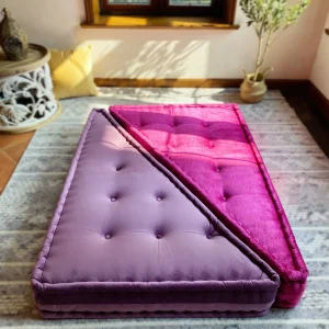 Top-down view of the Mah Jong sofa showcasing lavender and magenta cushions in a geometric arrangement.