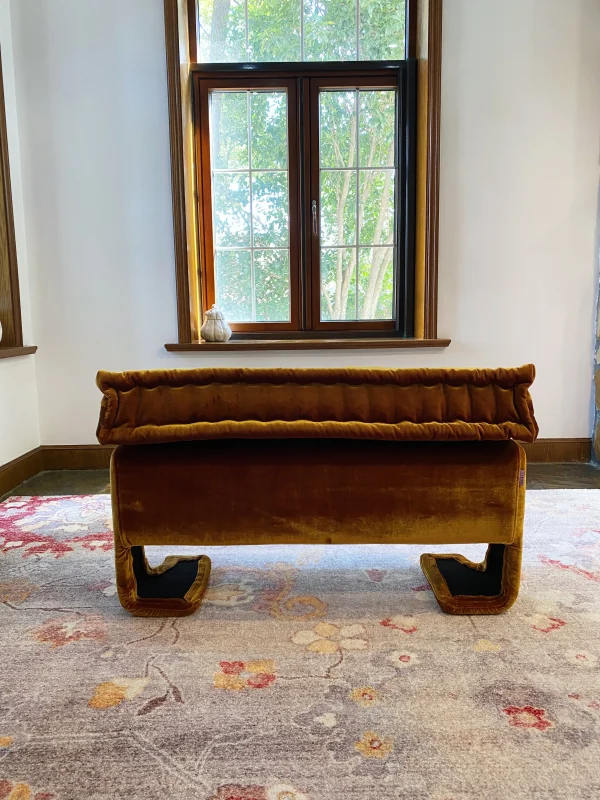 Fully unfolded French daybed Mah Jong sofa with a golden velvet cushion and tufted design.