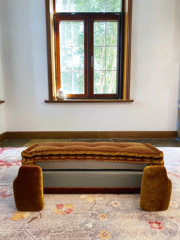 Rear view of the French daybed Mah Jong sofa with golden velvet upholstery, partially unfolded.