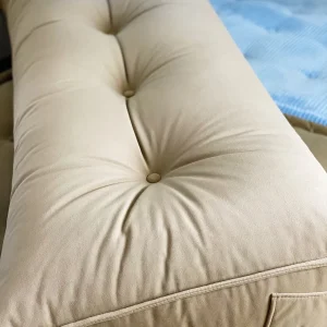 Close-up of the beige Mah Jong Daybed Sofa cushion with tufted detailing and soft fabric.