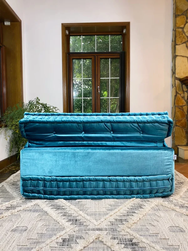 Back view of the teal Mah Jong sofa, showcasing its clean and sophisticated velvet finish.