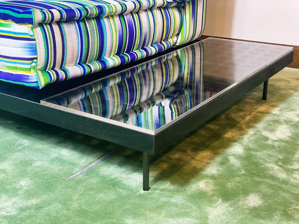 Find a stylish purpose and function in this teak coffee table with extended space, covered with resin table top! Entertain your family and guests!