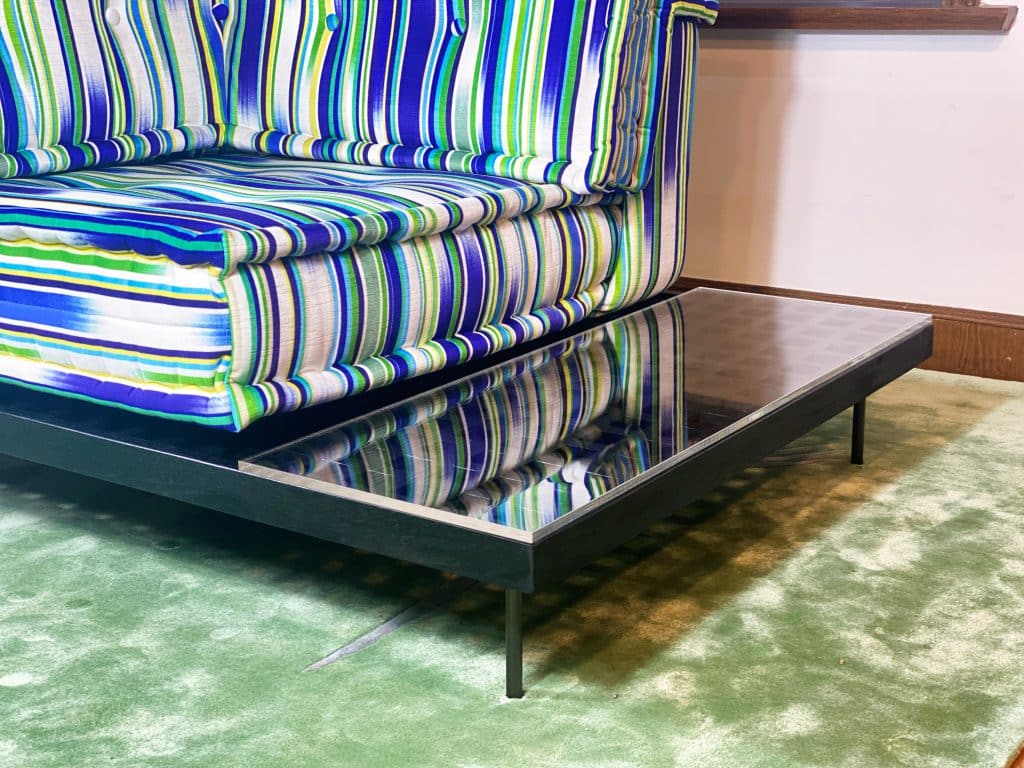 Find a stylish purpose and function in this teak coffee table with extended space, covered with resin table top! Entertain your family and guests!