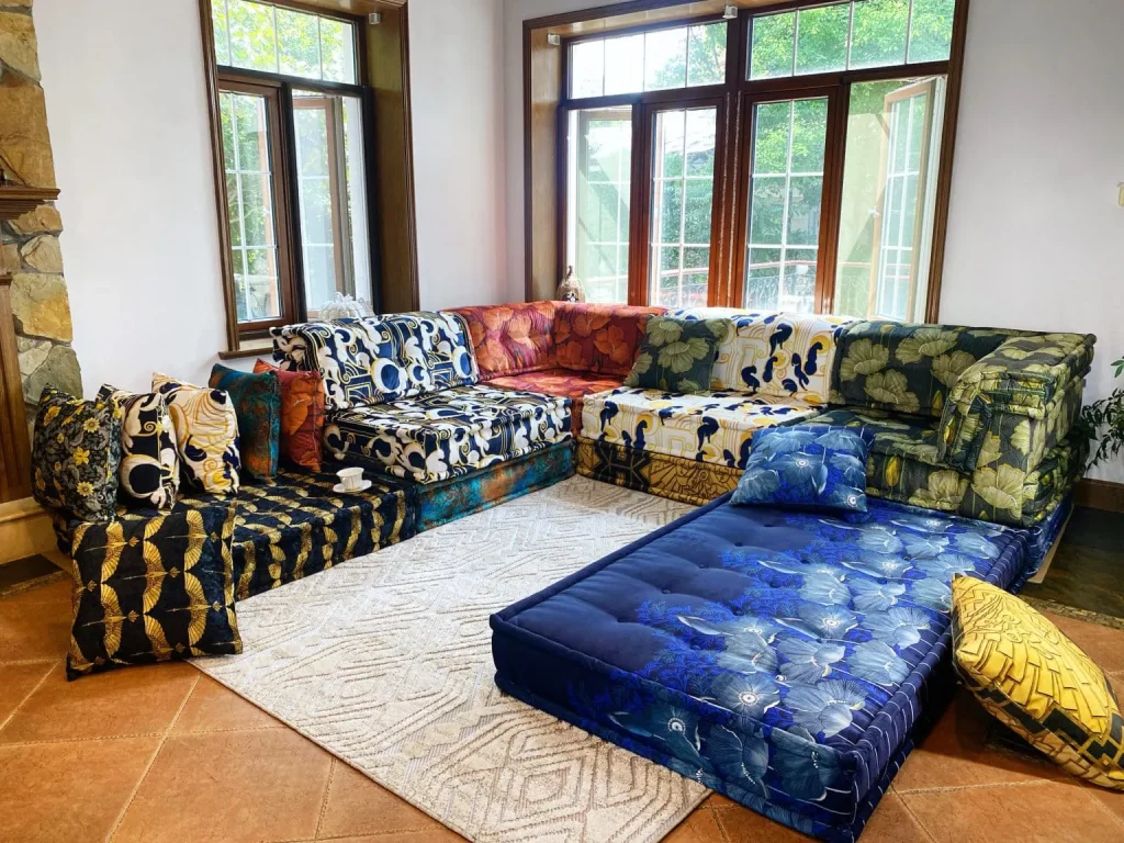 Modular Mah Jong sofa in eight mixed art deco fabrics for Adorn Croft's Austrian client