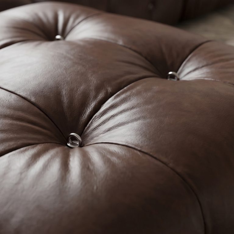 Brown leather Camaleonda ottoman.