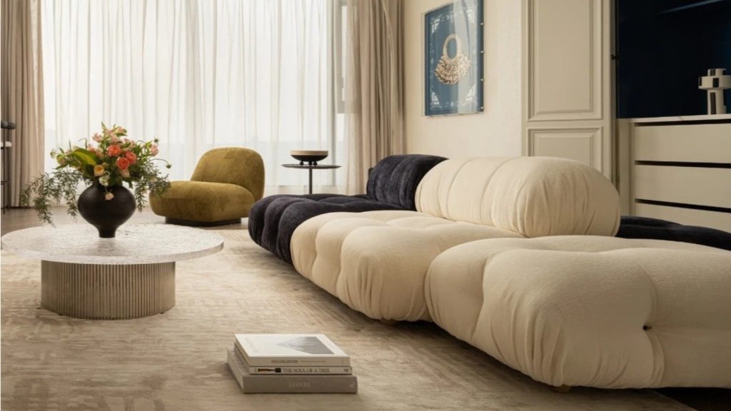 Minimal living room featuring a neutral sofa palette that feels balanced