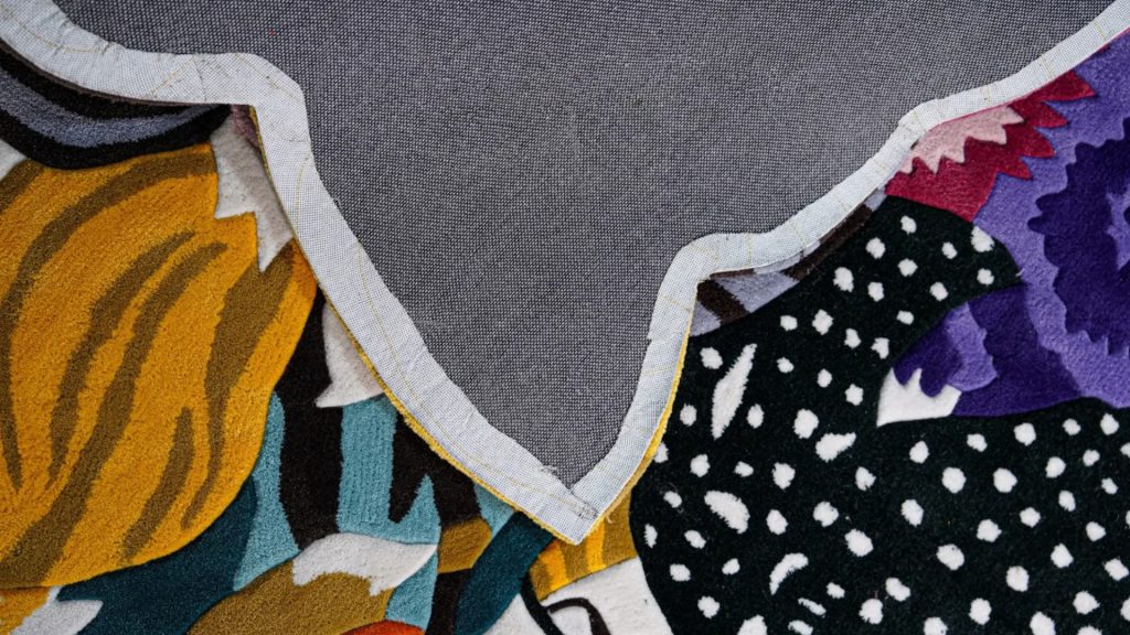 Bottom of the Mah Jong Floral rug showing a clean, anti-slip bottom of the rug.