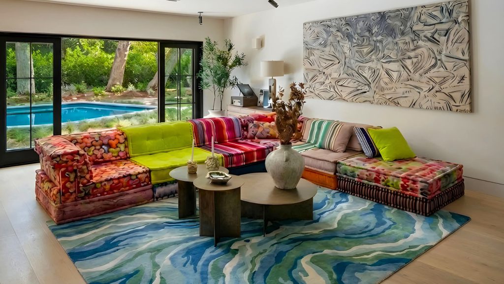 Adorn Croft's blue rug with white textures in a modern living room with a colorful sofa.