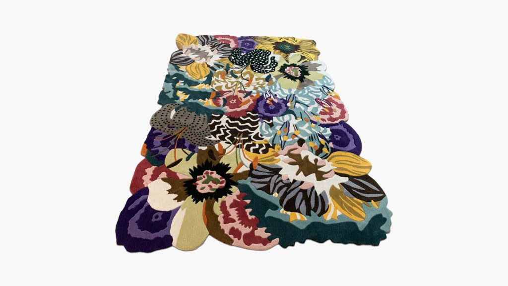 Overhead shot of the colorful Mah Jong Floral rug with a white background.