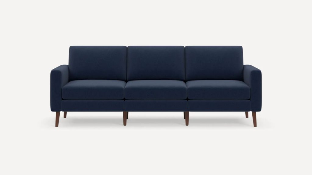Burrow's Nomad Sofa in a dark fabric.