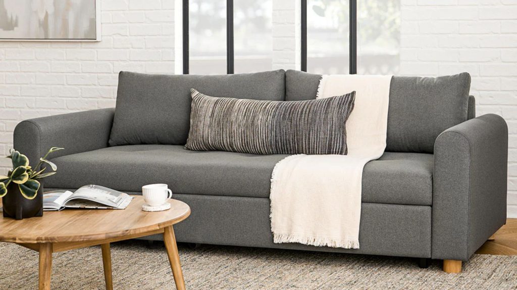 Article's Norby Sofa in a grey upholstery in a living room.