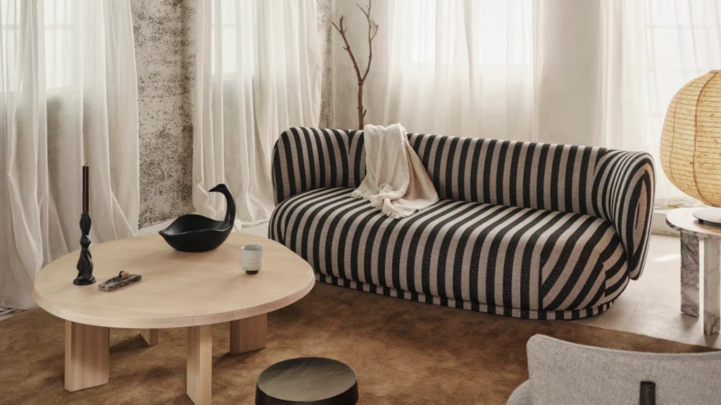 Ferm Living’s Rico Lounger Sofa in the corner of a living room.