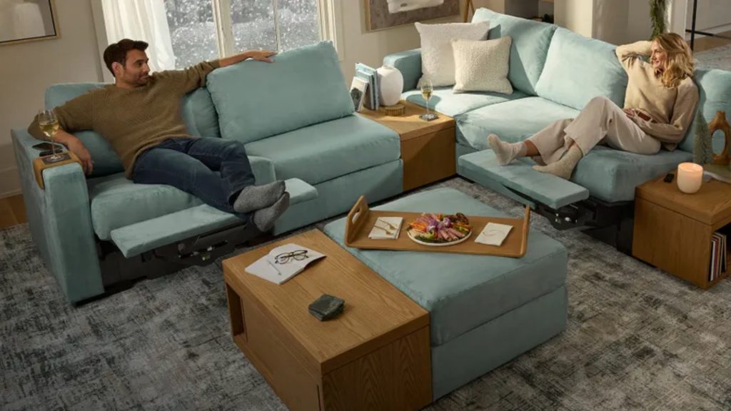 Lovesac sectional with a couple in a living room.