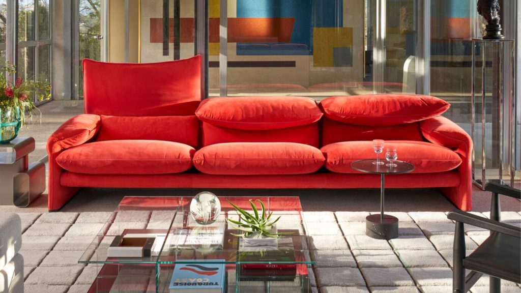 Cassina's Maralunga sofa in bright red in a living room.