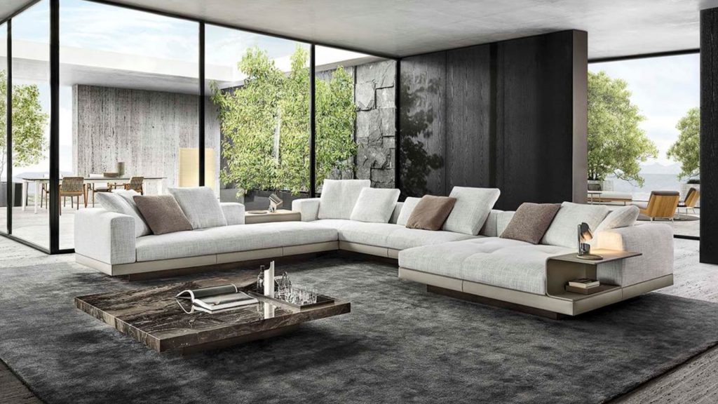 Minotti's Hamilton sofa in white upholstery in a modern living room.