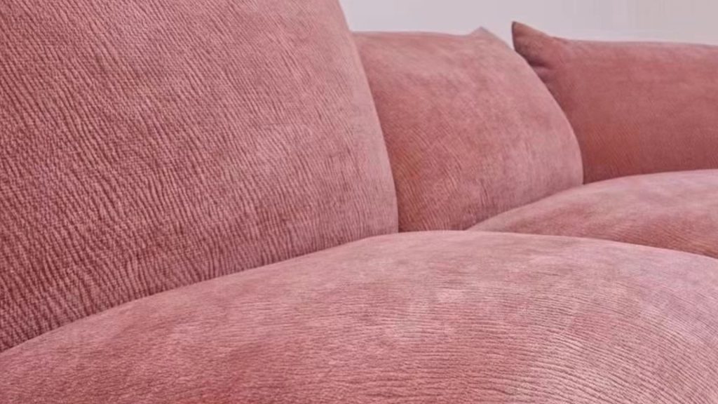 Closeup of Adorn Croft's Pink Petal Sofa.