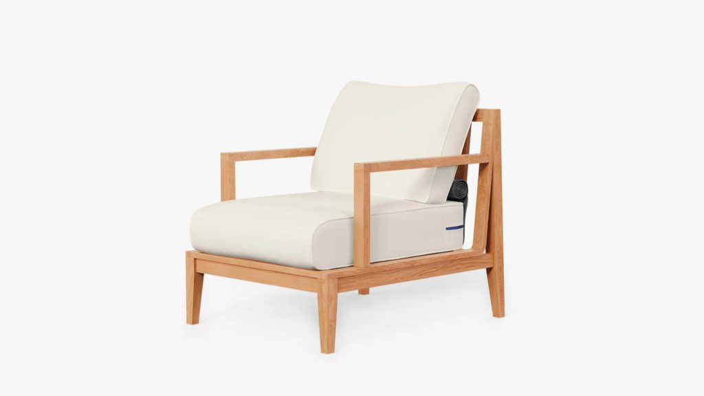 Outer's Teak Outdoor Armchair with a white background.
