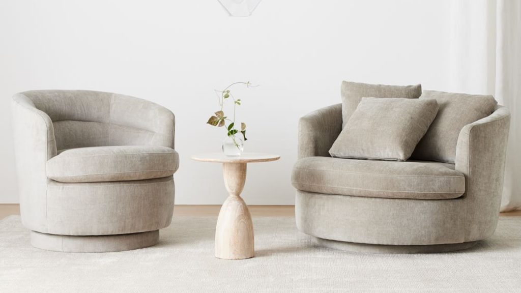 West Elm's Viv Grand Swivel Chair in a living room.