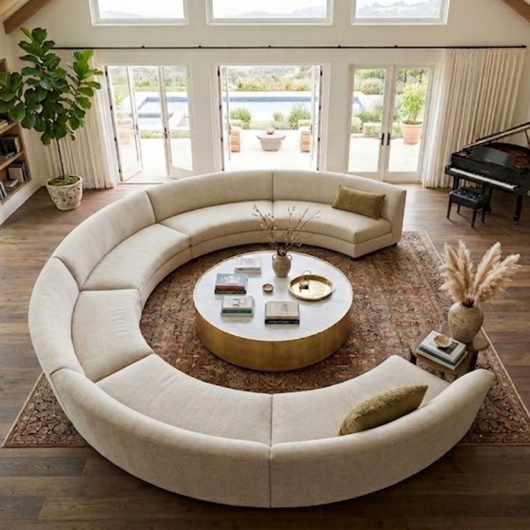 Large crescent sectional sofa in a modern living room.