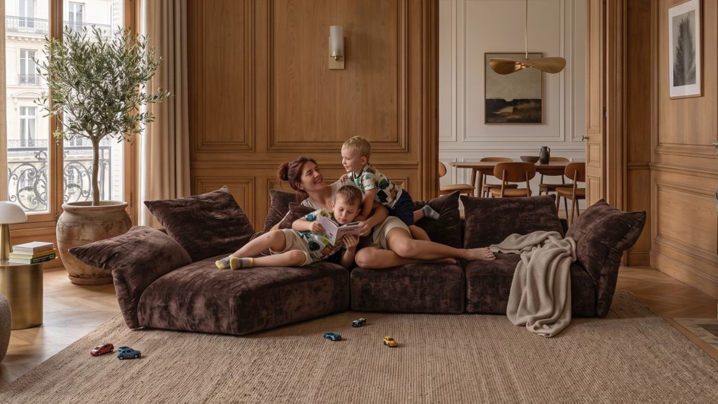 Mom and two children cuddling on Adorn Croft's Petal Sofa