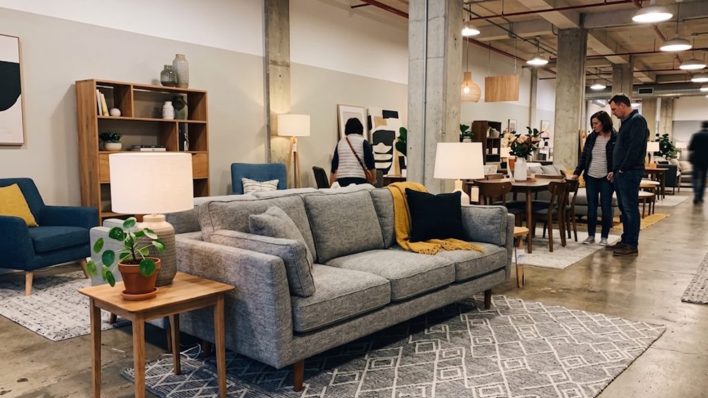 Grey couch in a furniture store.