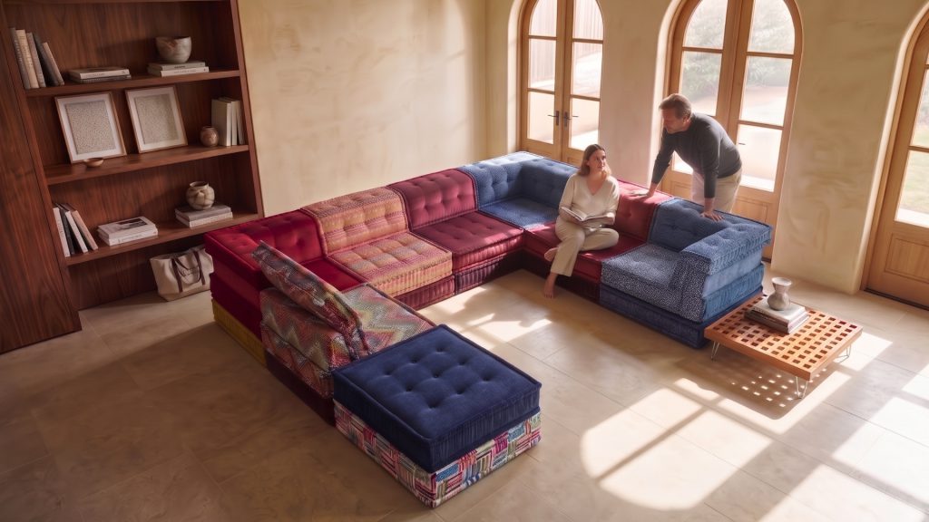 A tall couple with Adorn Croft's Kevin Colorful sofa.