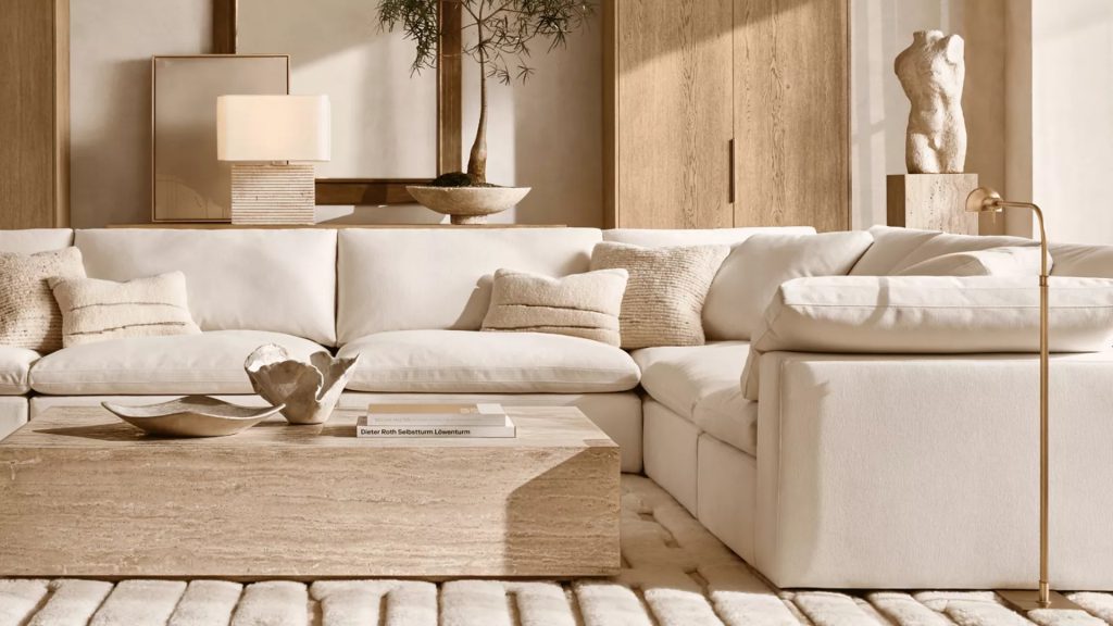 RH's cloud sofa in white upholstery.