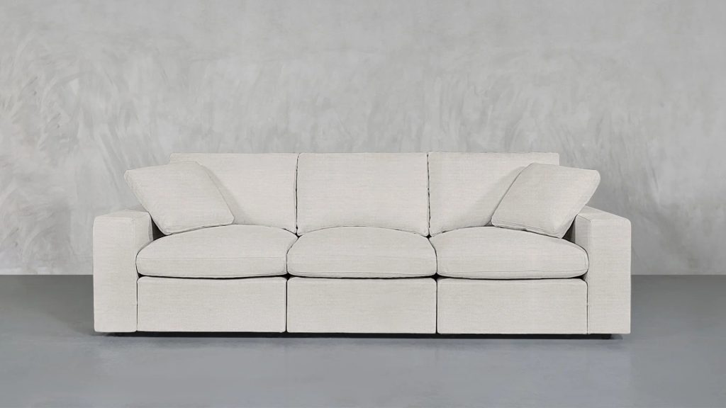 7th Avenue modular sofa with machine-washable covers in a neutral fabric in a modern living room