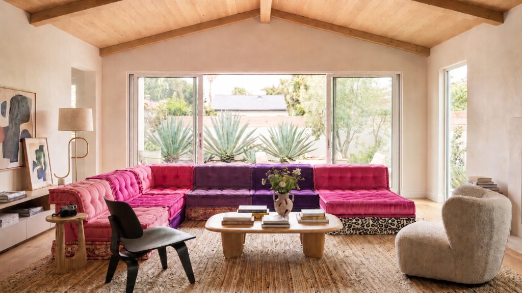 Adorn Croft Esther Colorful Sofa in pink performance fabric in an L-shaped modular configuration
