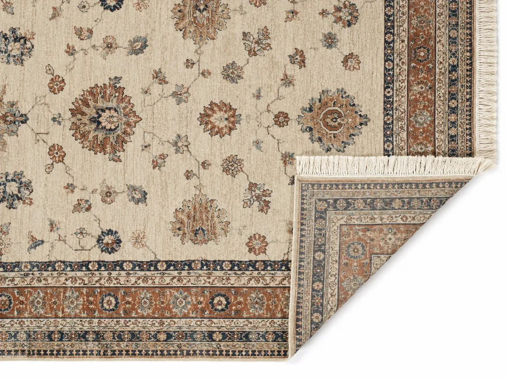 Front and underside of a hand-knotted rug showing the woven pattern