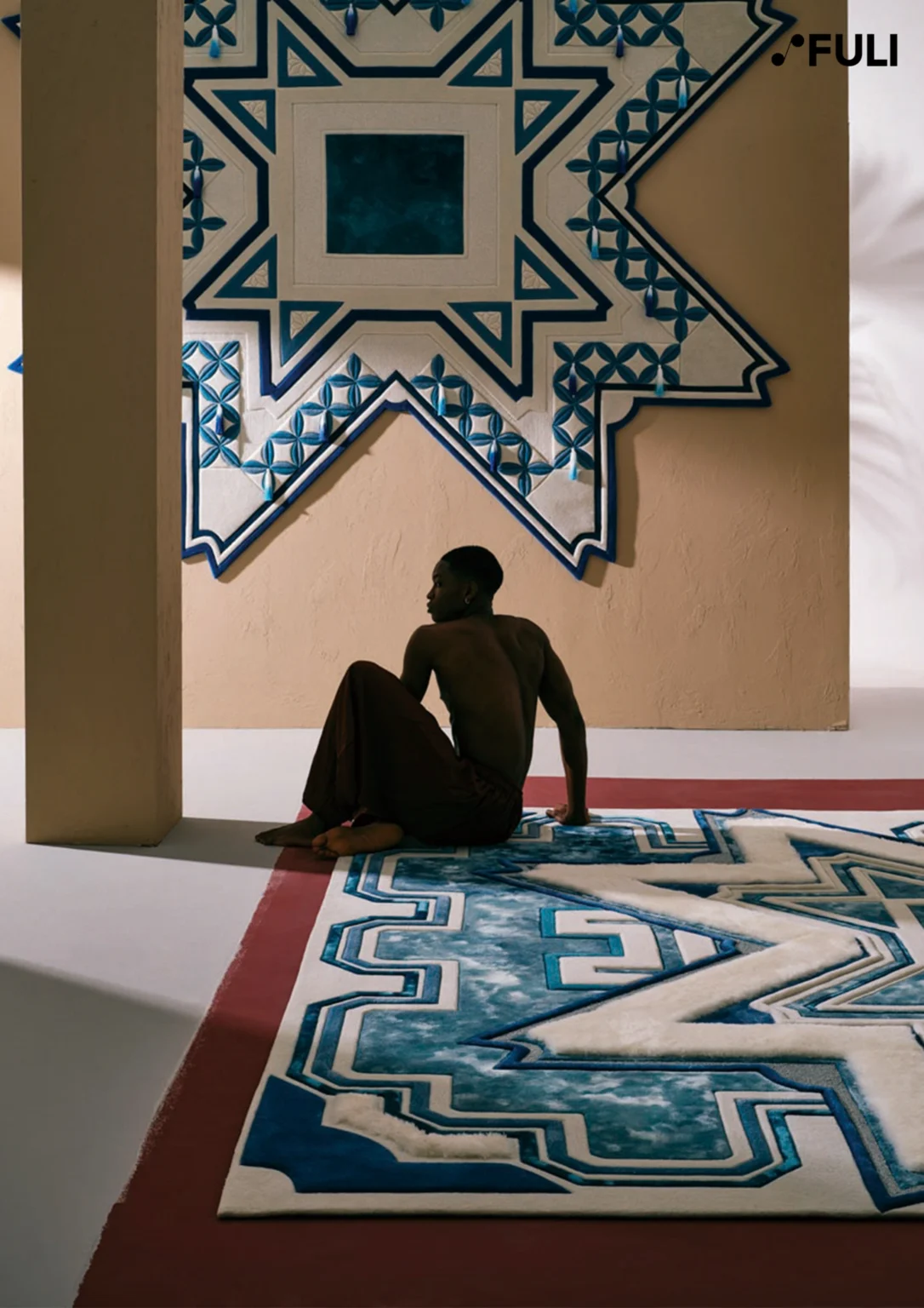 Statement carpet on the floor and a bold wall rug with an irregular shape