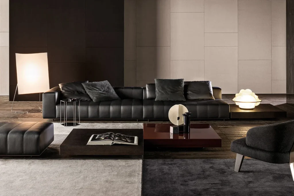 Minotti sofa in grey leather with slim tapered legs and matching armchairs