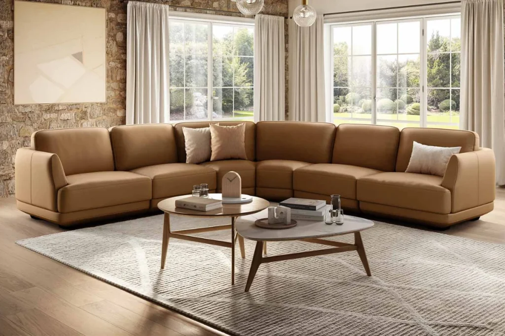 Natuzzi Italia Chesterfield-style sofa in brown leather with rolled arms and button tufting