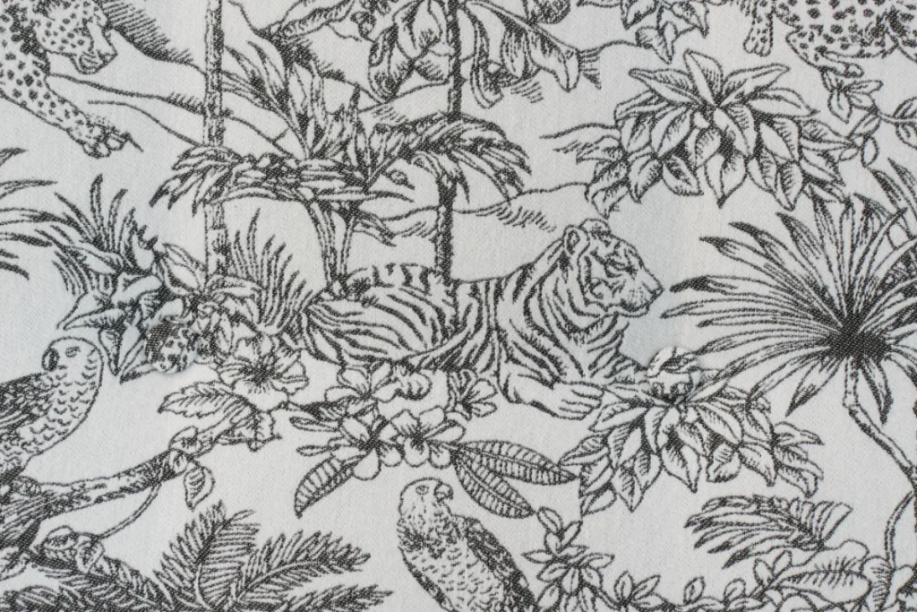White tropical sofa fabric featuring tropical and animal prints