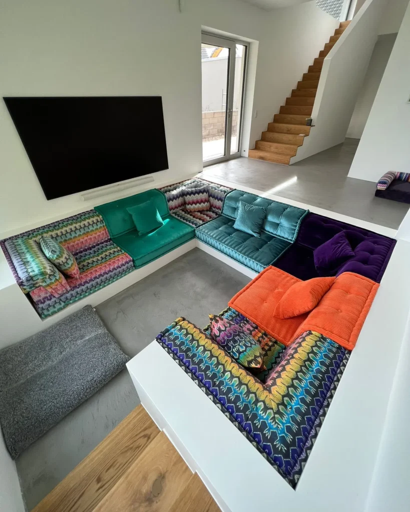 Trade project with a designer with a request for a custom Mah Jong sofa with velvet cushions fitted into a sunken living room